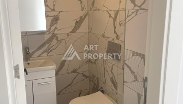 Двухуровневые апартаменты 2+1 с панорамным видом на море и крепость Алании. - Ракурс 9