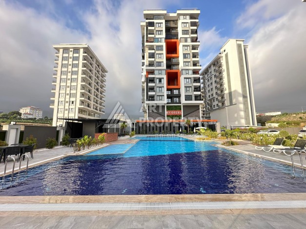 Квартира 1+1 в современном комплексе, 650 м до моря, центр Махмутлара - Ракурс 0