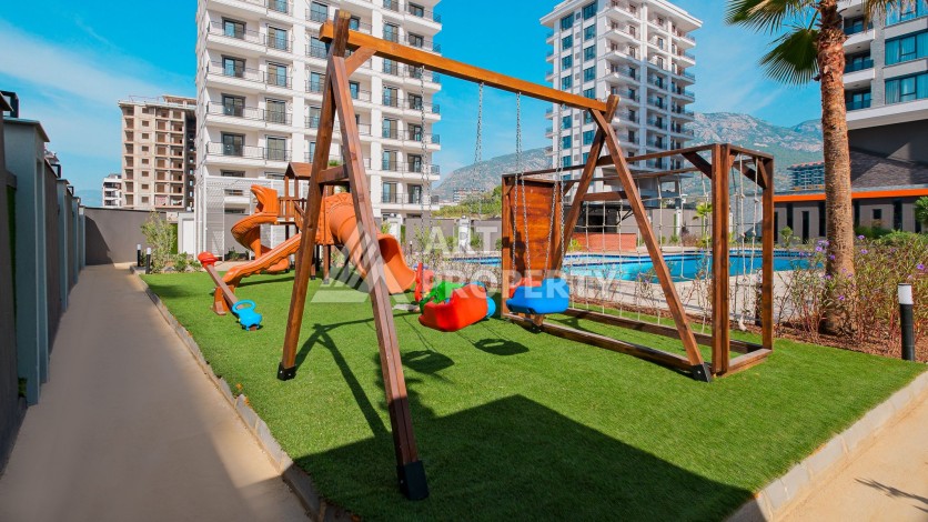 Квартира 1+1 в современном комплексе, 650 м до моря, центр Махмутлара - Ракурс 1