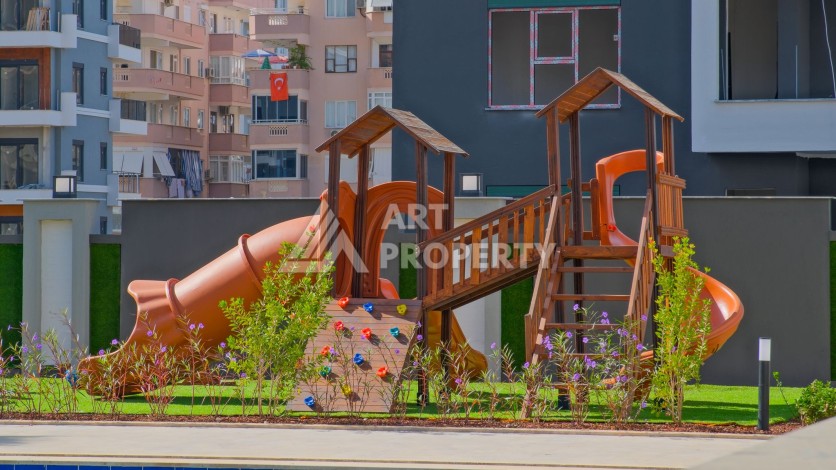 Квартира 1+1 в современном комплексе, 650 м до моря, центр Махмутлара - Ракурс 5