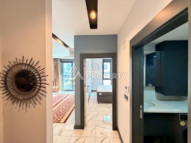 Квартира 1+1 в современном комплексе, 650 м до моря, центр Махмутлара - Ракурс 16