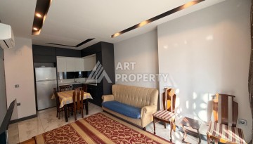 Квартира 1+1 в современном комплексе, 650 м до моря, центр Махмутлара - Ракурс 20