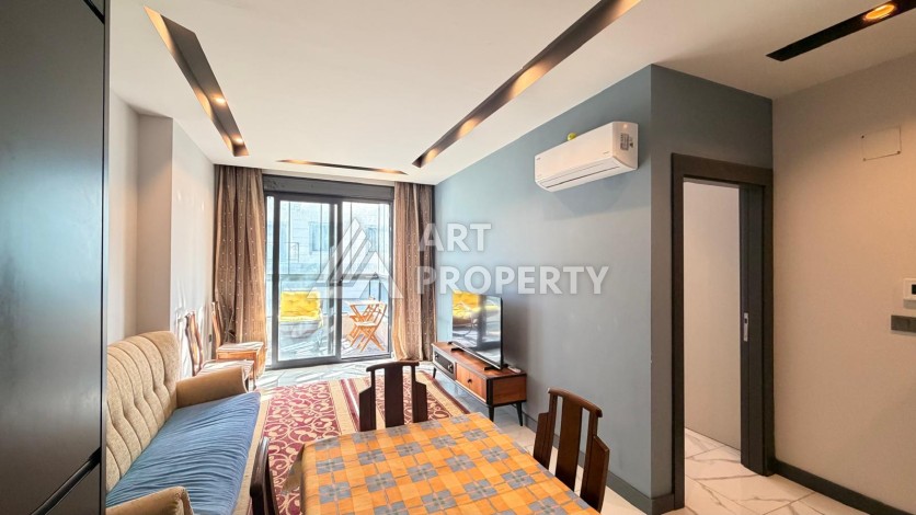 Квартира 1+1 в современном комплексе, 650 м до моря, центр Махмутлара - Ракурс 21