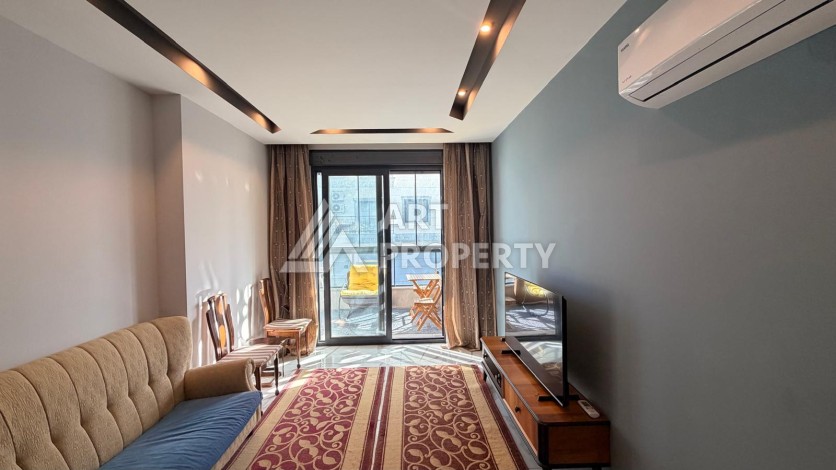 Квартира 1+1 в современном комплексе, 650 м до моря, центр Махмутлара - Ракурс 22