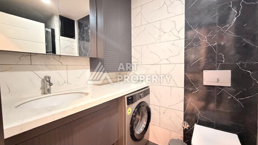 Квартира 1+1 в современном комплексе, 650 м до моря, центр Махмутлара - Ракурс 25