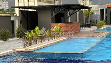 Квартира 1+1 в современном комплексе, 650 м до моря, центр Махмутлара - Ракурс 30