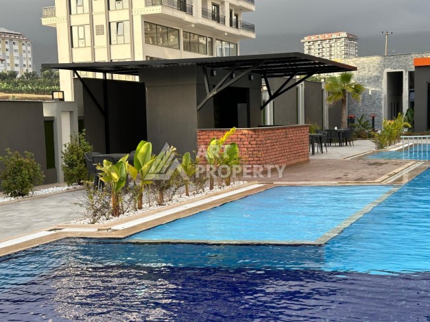 Квартира 1+1 в современном комплексе, 650 м до моря, центр Махмутлара - Ракурс 29