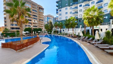 Квартира 1+1 в престижной резиденции района Махмутлар, 50 кв.м. - Ракурс 2