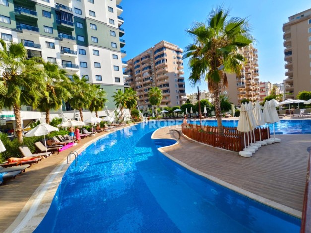 Квартира 1+1 в престижной резиденции района Махмутлар, 50 кв.м. - Ракурс 2