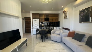 Квартира 1+1 в престижной резиденции района Махмутлар, 50 кв.м. - Ракурс 12