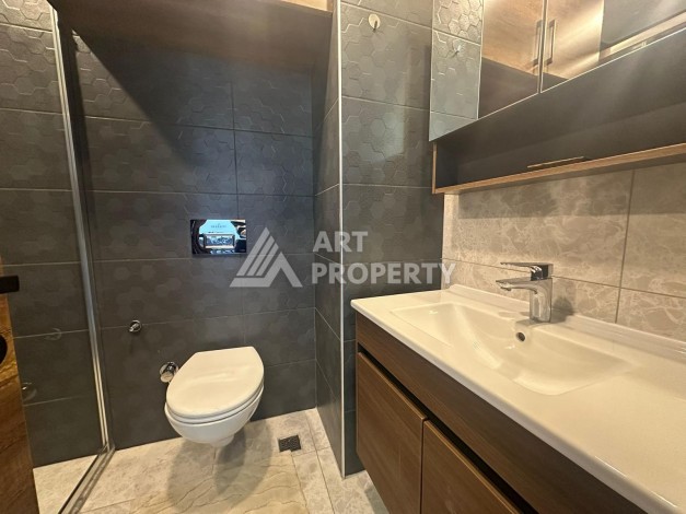 Квартира 1+1 в престижной резиденции района Махмутлар, 50 кв.м. - Ракурс 13