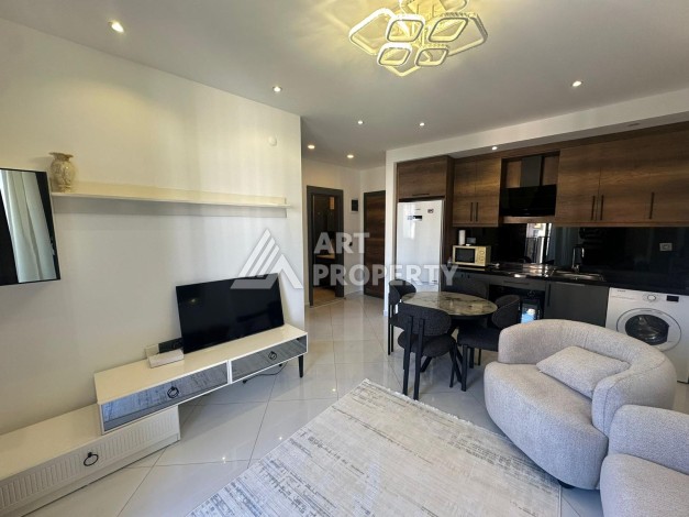 Квартира 1+1 в престижной резиденции района Махмутлар, 50 кв.м. - Ракурс 14