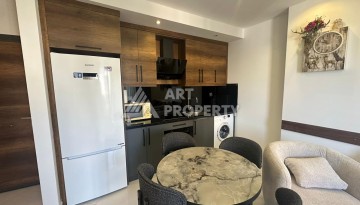 Квартира 1+1 в престижной резиденции района Махмутлар, 50 кв.м. - Ракурс 16