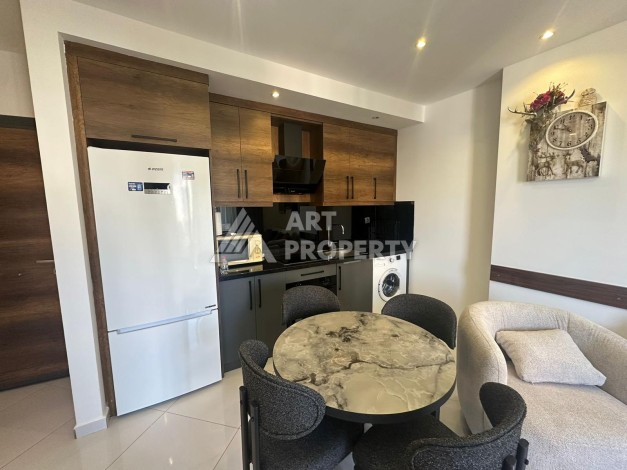 Квартира 1+1 в престижной резиденции района Махмутлар, 50 кв.м. - Ракурс 15