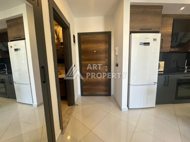 Квартира 1+1 в престижной резиденции района Махмутлар, 50 кв.м. - Ракурс 18