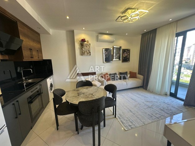 Квартира 1+1 в престижной резиденции района Махмутлар, 50 кв.м. - Ракурс 21