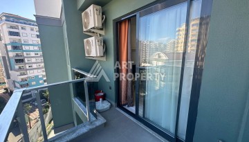 Квартира 1+1 в престижной резиденции района Махмутлар, 50 кв.м. - Ракурс 26