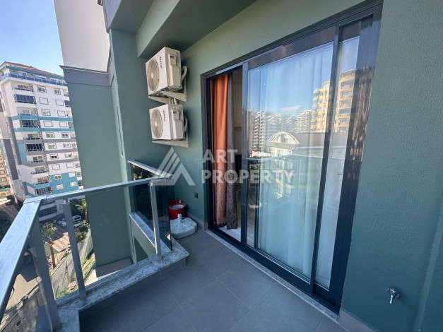 Квартира 1+1 в престижной резиденции района Махмутлар, 50 кв.м. - Ракурс 25