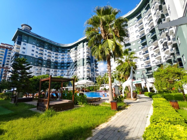 Квартира 1+1 в престижной резиденции района Махмутлар, 50 кв.м. - Ракурс 27