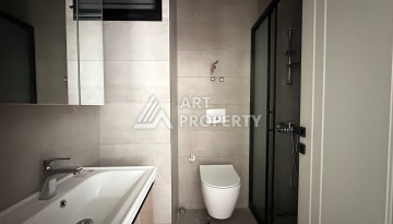 Апартаменты 1+1 в районе Махмутлар в современном жилом комплексе с полной инфраструктурой. - Ракурс 4