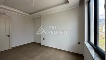 Апартаменты 1+1 в районе Махмутлар в современном жилом комплексе с полной инфраструктурой. - Ракурс 7