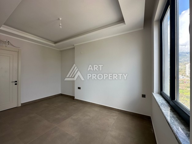 Апартаменты 1+1 в районе Махмутлар в современном жилом комплексе с полной инфраструктурой. - Ракурс 6