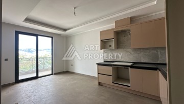 Апартаменты 1+1 в районе Махмутлар в современном жилом комплексе с полной инфраструктурой. - Ракурс 8