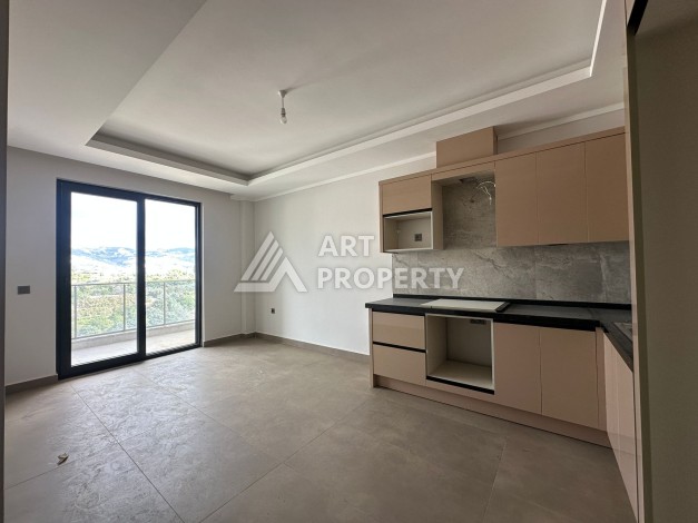 Апартаменты 1+1 в районе Махмутлар в современном жилом комплексе с полной инфраструктурой. - Ракурс 7