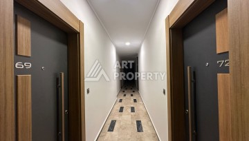 Апартаменты 1+1 в районе Махмутлар в современном жилом комплексе с полной инфраструктурой. - Ракурс 9