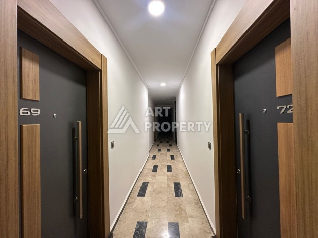 Апартаменты 1+1 в районе Махмутлар в современном жилом комплексе с полной инфраструктурой. - Ракурс 8