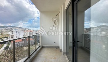 Апартаменты 1+1 в районе Махмутлар в современном жилом комплексе с полной инфраструктурой. - Ракурс 10