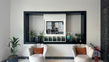 Апартаменты 1+1 в районе Махмутлар в современном жилом комплексе с полной инфраструктурой. - Ракурс 12