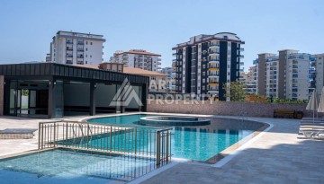 Апартаменты 1+1 в районе Махмутлар в современном жилом комплексе с полной инфраструктурой. - Ракурс 13