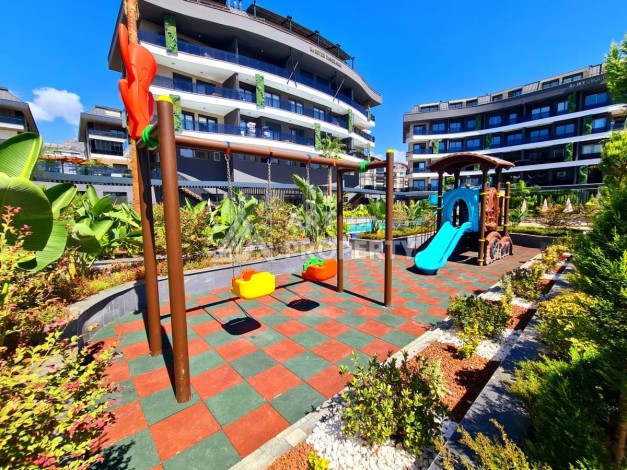 Квартира 1+1 в элитной резиденции района Оба, Алания — 55 м² с видом на бассейн - Ракурс 3