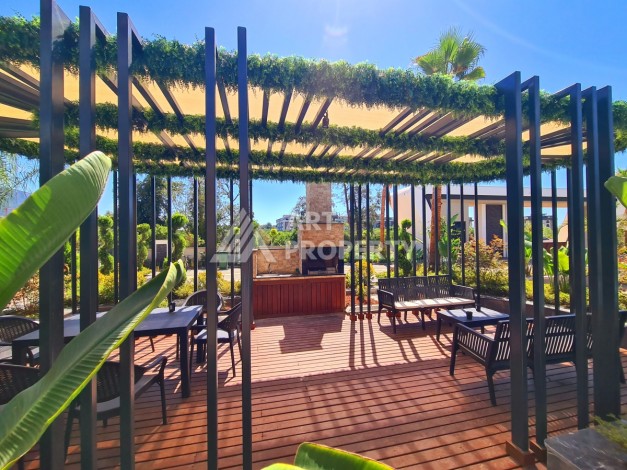 Квартира 1+1 в элитной резиденции района Оба, Алания — 55 м² с видом на бассейн - Ракурс 5