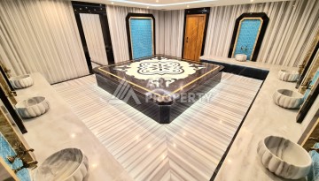 Квартира 1+1 в элитной резиденции района Оба, Алания — 55 м² с видом на бассейн - Ракурс 12