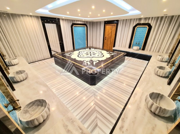 Квартира 1+1 в элитной резиденции района Оба, Алания — 55 м² с видом на бассейн - Ракурс 11