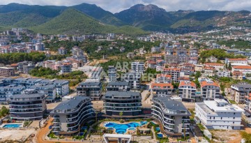 Квартира 1+1 в элитной резиденции района Оба, Алания — 55 м² с видом на бассейн - Ракурс 13