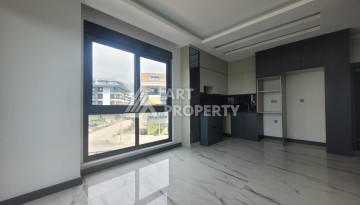 Квартира 1+1 в элитной резиденции района Оба, Алания — 55 м² с видом на бассейн - Ракурс 16