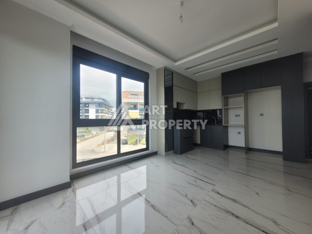 Квартира 1+1 в элитной резиденции района Оба, Алания — 55 м² с видом на бассейн - Ракурс 15