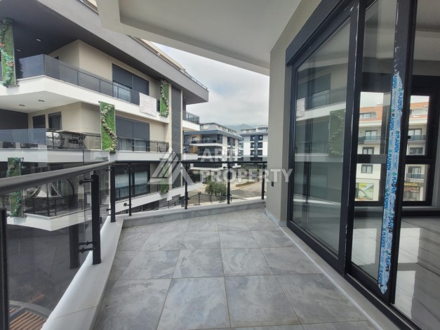 Квартира 1+1 в элитной резиденции района Оба, Алания — 55 м² с видом на бассейн - Ракурс 17