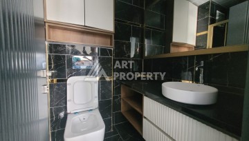 Квартира 1+1 в элитной резиденции района Оба, Алания — 55 м² с видом на бассейн - Ракурс 22