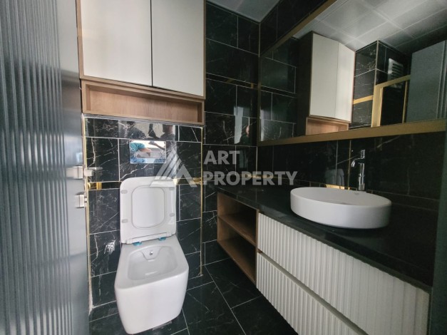 Квартира 1+1 в элитной резиденции района Оба, Алания — 55 м² с видом на бассейн - Ракурс 21