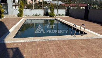 Двухуровневая квартира 4+1 с видом на море в районе Чыплаклы, Алания — 170 м² - Ракурс 32