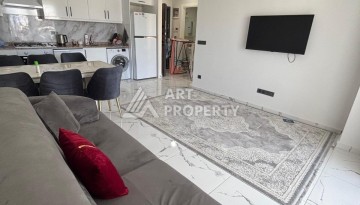 Апартаменты 1+1 с видом на море в районе Каргыджак, всего в 250 метрах от пляжа. - Ракурс 1