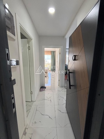 Апартаменты 1+1 с видом на море в районе Каргыджак, всего в 250 метрах от пляжа. - Ракурс 1