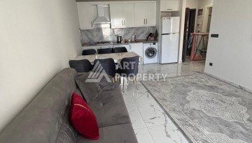 Апартаменты 1+1 с видом на море в районе Каргыджак, всего в 250 метрах от пляжа. - Ракурс 4