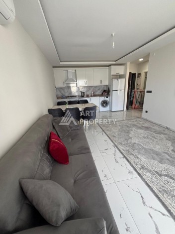 Апартаменты 1+1 с видом на море в районе Каргыджак, всего в 250 метрах от пляжа. - Ракурс 3