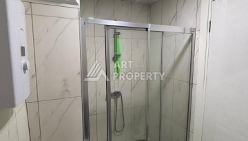 Апартаменты 1+1 с видом на море в районе Каргыджак, всего в 250 метрах от пляжа. - Ракурс 5