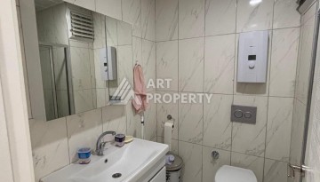 Апартаменты 1+1 с видом на море в районе Каргыджак, всего в 250 метрах от пляжа. - Ракурс 7